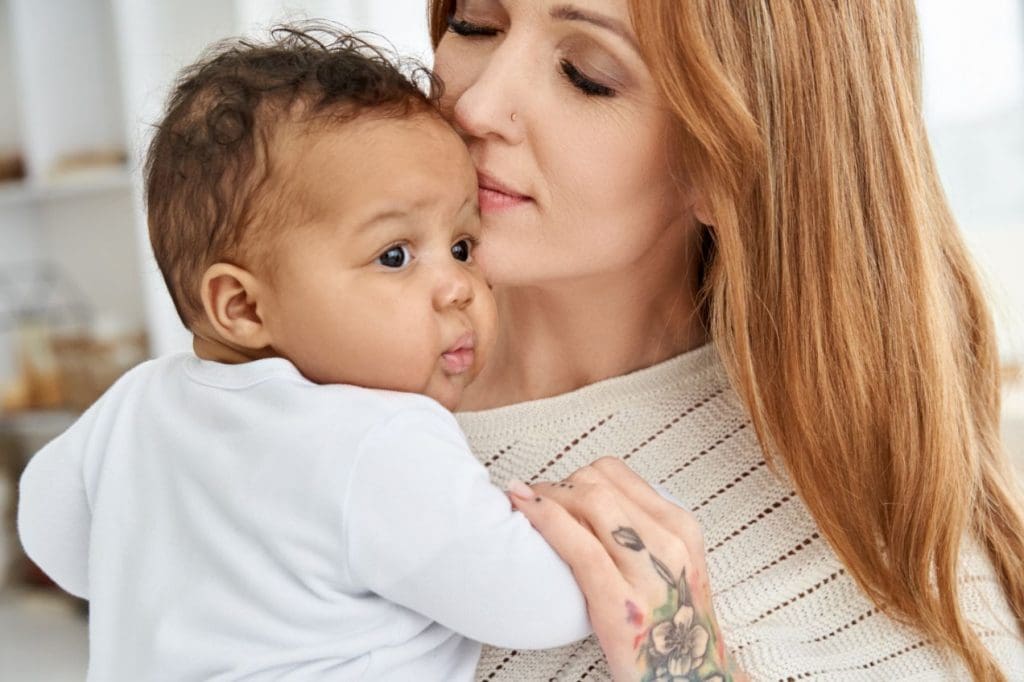 Single mother receiving postpartum support