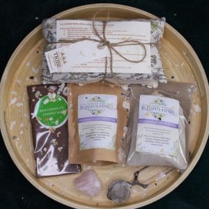 A smal loss hamper containing a range of soothing and memory making items