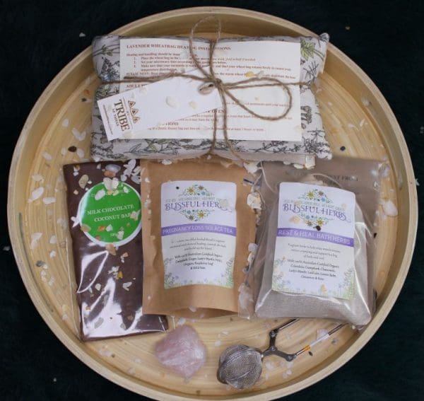 A smal loss hamper containing a range of soothing and memory making items